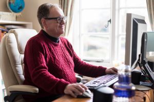 Person using superfast broadband in Shropshire village