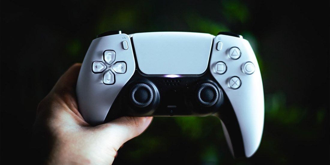 PS5 controller white over dark background
