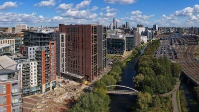 An aerial view of the canal going through Leeds city centre